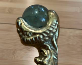 W28 - $30. "Bridges" Eagle Claw Cane with black aluminum shaft. 