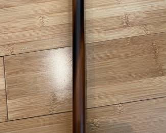 W31 - $40. Carved Shell Cane with brass band and solid wood cane. 