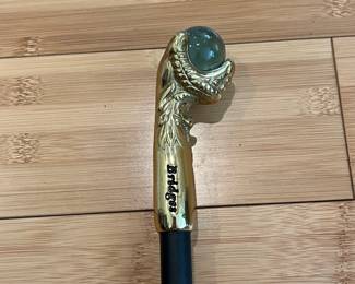 W28 - $30. "Bridges" Eagle Claw Cane with black aluminum shaft. 