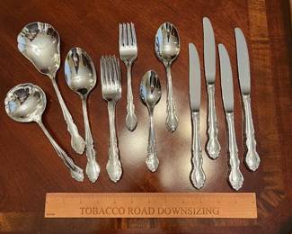 W100 - $85. Oneida Dover 4-5 Place settings with 3 serving utensils. 