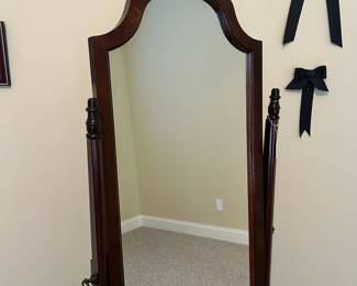 W45 - $60. Bombay Company Cheval Floor Mirror. Measures 18.25" wide x 62.5" tall. 