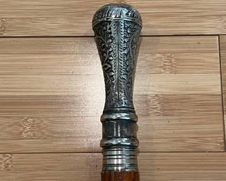 W29 - $30. Silver Plated Handle with straight wooden Cane. 