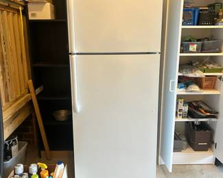 W94 - $200. GE Fridge / Freezer from 2014. Model GTH18GBDHRWW. Serial # RD742160. Measures 28" x 31" deep x 67" tall. Has been used in the garage. The top is dirty but the rest looks good and it could be used inside!