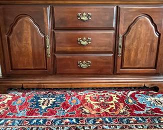 W72 - $150. American Drew Lighted China Cabinet - moves in 2 pieces. Measures 52" wide x 16" deep x 78" tall. Base is 27". Top is 51". Solid wood - very good condition with a few minor marks. 2 glass shelves - not adjustable. 