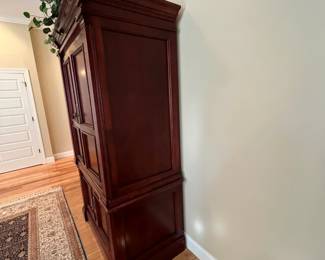 W14 - $50. Large 2 Piece Media Armoire. Measures 47" wide x 26" deep x 80" tall. Base does have some scratches. Moves in 2 pieces! Top & Bottom making it easier to maneuver!