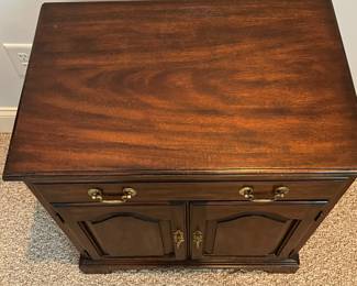 W20 - $175. Henkel-Harris single nightstand / cabinet. Style #114. Single drawer slides easily and doors open to the cabinet with single shelf inside. Measures 24" wide x 16" deep x 25.75" tall. Sturdy and in very good condition!