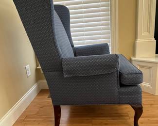 W16 - $75. Blue Wing Back Chair. Measures 26" wide x 27" deep x 43" tall. Floor to seat is 19". Very good condition - upholstery & frame. Sturdy!