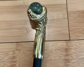 W28 - $30. "Bridges" Eagle Claw Cane with black aluminum shaft. 
