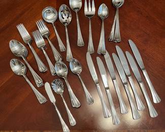 W103 - $50. 63 pcs Stainless Flatware. 