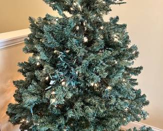 W90 - $50. 6.5' Christmas Tree. Does have a strand of lights out. 