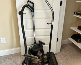 W65 - $150. Rainbow SE Vacuum. Does turn on but handle has tape "repair". Includes what is photographed. 