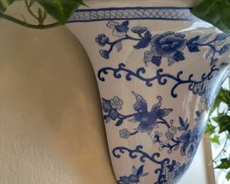 W35 - $25. PAIR of Wall Pockets with faux ivy. Measures 13" wide x 7" out from the wall x 6.5" tall (no plant)