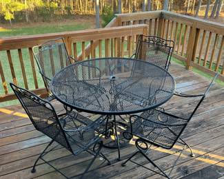 W75 - $150. Round Iron Table with 4 bouncy chairs. Table is 4' across x 29.5" tall. Everything is in very good condition and nothing is rusted through. 