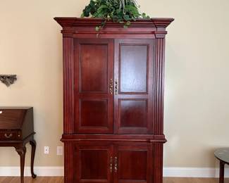 W14 - $50. Large 2 Piece Media Armoire. Measures 47" wide x 26" deep x 80" tall. Base does have some scratches. Moves in 2 pieces! Top & Bottom making it easier to maneuver!