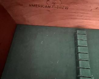 W72 - $150. American Drew Lighted China Cabinet - moves in 2 pieces. Measures 52" wide x 16" deep x 78" tall. Base is 27". Top is 51". Solid wood - very good condition with a few minor marks. 2 glass shelves - not adjustable. 