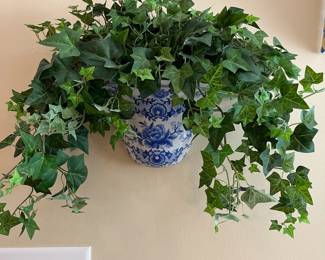 W35 - $25. PAIR of Wall Pockets with faux ivy. Measures 13" wide x 7" out from the wall x 6.5" tall (no plant)