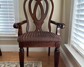 W12 - $300. Ashley Furniture Double Pedestal Table with 6 Chairs. Measures 42" wide x 70" x 30" tall. Has 1 leaf that can add another 18".  2 captains chairs - 4 regular. All sturdy and upholstery is in great condition!