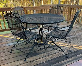 W75 - $150. Round Iron Table with 4 bouncy chairs. Table is 4' across x 29.5" tall. Everything is in very good condition and nothing is rusted through. 