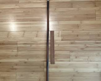 W31 - $40. Carved Shell Cane with brass band and solid wood cane. 