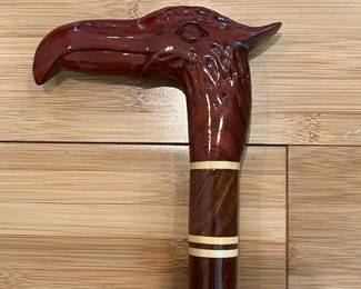W25 - $50. Banded Wood with Carved Bird Head. 
