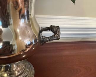 W1 - $35. Silver Plated Vase with floral arrangement. Measures 2' tall. 