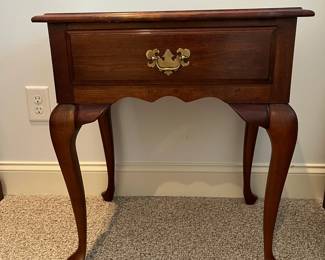 W22 - $45. Single End Table. Measures 22.5" wide x 17" deep x 26" tall. Top shows a bit of wear but overall sturdy and in good condition! Drawer slides easily. 