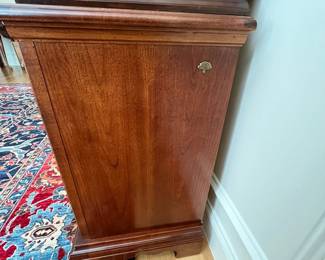 W72 - $150. American Drew Lighted China Cabinet - moves in 2 pieces. Measures 52" wide x 16" deep x 78" tall. Base is 27". Top is 51". Solid wood - very good condition with a few minor marks. 2 glass shelves - not adjustable. 