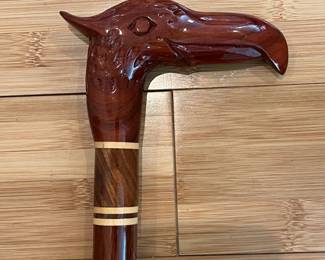 W25 - $50. Banded Wood with Carved Bird Head. 