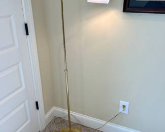 W60 - $50. Brass floor lamp. Adjustable height. Tallest 58" tall. Good condition. Some scuffs and a couple dents on the base.