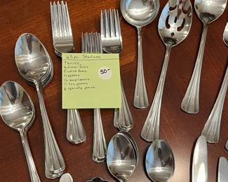 W103 - $50. 63 pcs Stainless Flatware. 