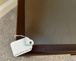 W42 - $50. Single Solid Wood Side Table with glass top. Measures 22" wide x 27" deep x 23.5" tall. Drawer slides easily. Excellent Condition. 