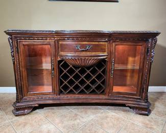 Hidden button in front turns lighting on or off.