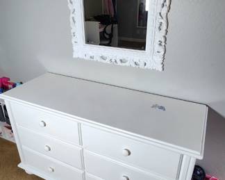 White wood bed with headboard & Footboard. Set includes small matching side table, six drawer dresser (sticker on top can be removed), and wall mounted mirror. Can be sold at discount as a set or individually!