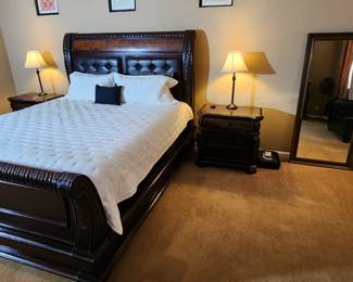 Stunning and elegant King wood bedroom set. Set includes bed frame & headboard, two matching end tables, 9 drawer dresser, two table lamps and one floor lamp (wear on headboard but can easily be reupholstered). Can sell at discount as set or individually!
