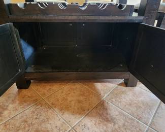 Bar height nearly new dining set. Set includes bench and four matching chairs. Table had storage underneath as well!