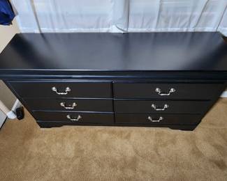 Black wood bed with headboard & Footboard and frame. Set includes two matching side tables, and six drawer dresser. Can be sold at discount as a set or individually!