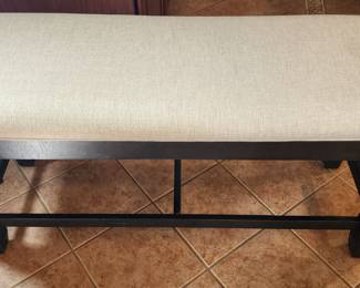 Bar height nearly new dining set. Set includes bench and four matching chairs. Table had storage underneath as well!