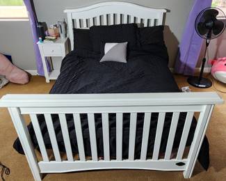 White wood bed with headboard & Footboard. Set includes small matching side table, six drawer dresser (sticker on top can be removed), and wall mounted mirror. Can be sold at discount as a set or individually!