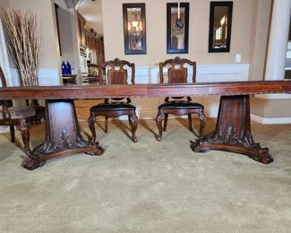Dining set had carved pedestal feel that are solid yet ornate. 
