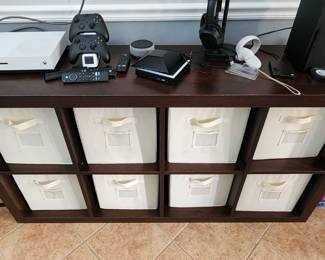 Wood cubby table with eight cloth storage bins included!