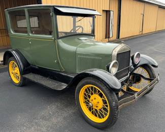 1927 Ford Model T . Stored in the airplane hangar. Not running. Needs maintenance & restoration. Has been sitting for a long period of time. No title, No keys