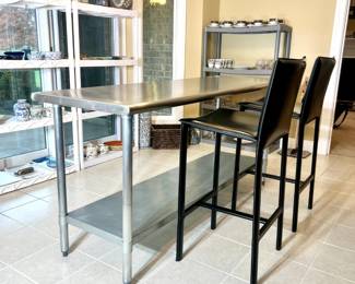 stainless steel prep table, two tall stools

