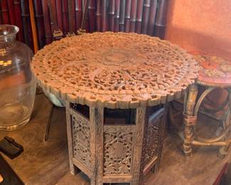Carved Round Vintage Teak Coffee Table, Large Glass Vase, and Bamboo Side Table