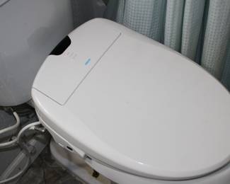 Omigo bidet, bolt-on to any toilet. seat warmer, remote control