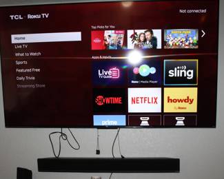 TCL TV with Vizio surround sound system