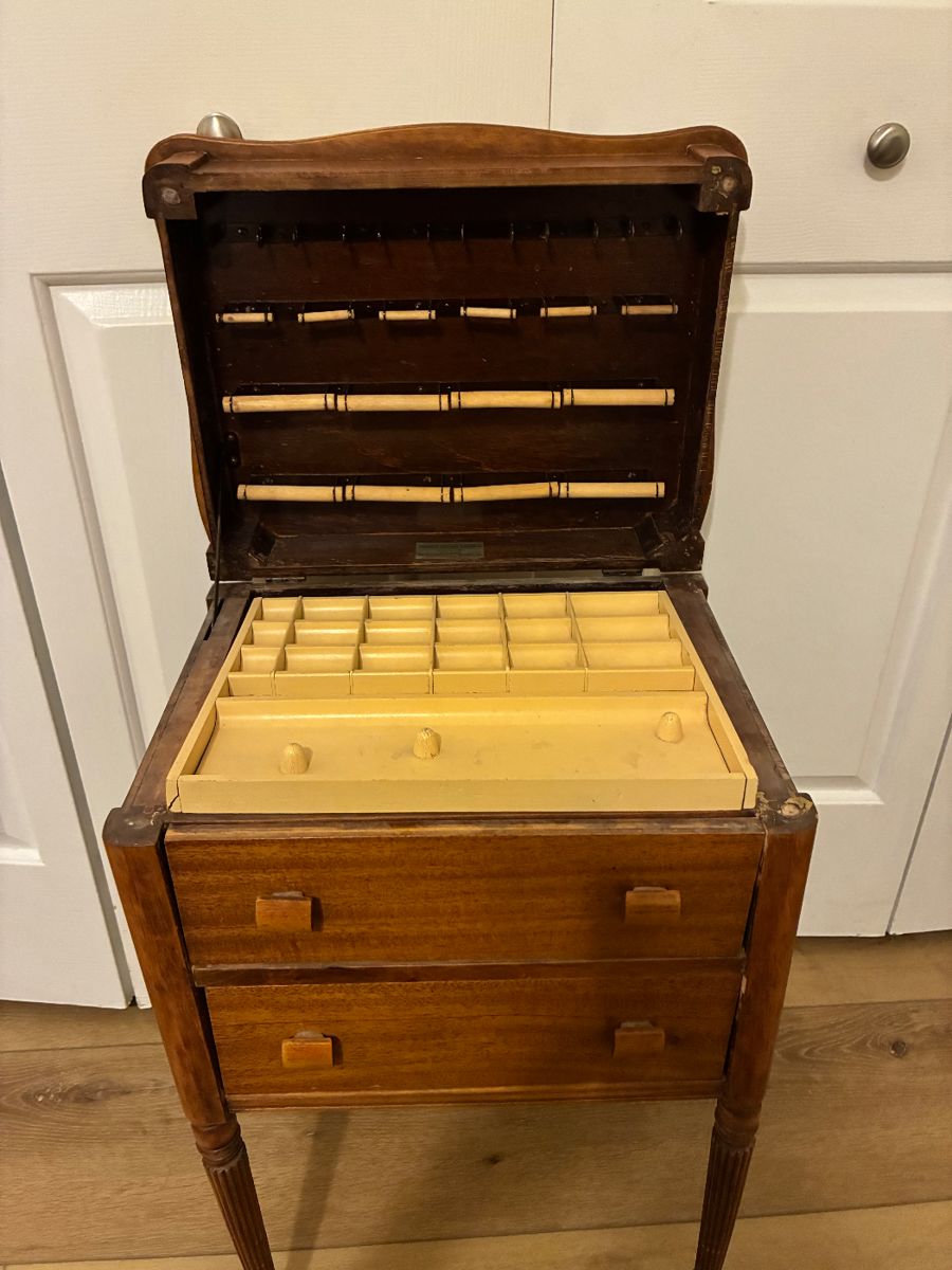 Vintage sewing cabinet, places for thread, notions. Two additional drawers