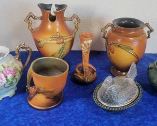 Roseville pottery pine cone, gardenia, clematis patterns, Lefton pitcher, cut glass chicken candy dish