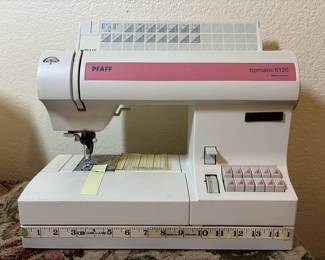 Pfaff Tipmatic 6120, mechanical, IDT. Includes case, bobbnins, several presser feet. Recently serviced - my go-to machine for classes.