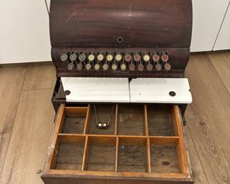 Cash register, drawer opens when price is pushed