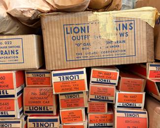 A collection of vintage Lionel model train boxes. The boxes are for various accessories and cars in "O" Gauge
No. 022 Switches, No. 6465 Tank Car, No. 3461 Automatic Lumber Car, No. 2046W Tender with Whistle